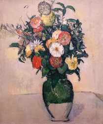 Blommor i en grön vas