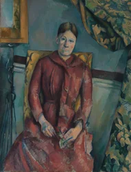 Madame Cézanne Hortense Fiquet, 1850-1922 i en röd klänning, 1888-90.