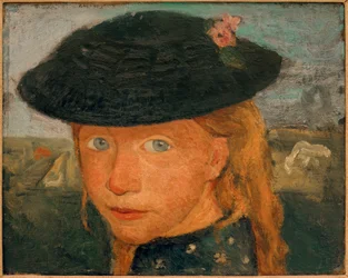 Huvudet på en liten flicka med en stråhatt