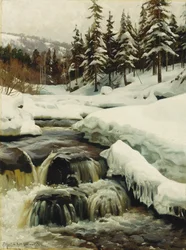 Ett vinterlandskap med en bergstorrent