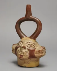 Stigbygelkärl i form av flerhövdade kattväsen, A.D. 250-500 (keramik och pigment)