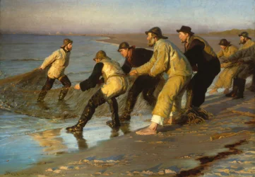 Fiskare drar nät på Skagens strand
