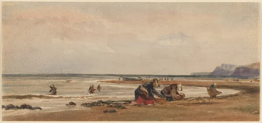 Tångsamlare på stranden vid Redcar i Yorkshire