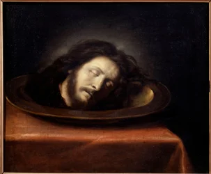 Chef för Saint Jean Baptiste placerad på en platt målning av Philippe de Champaignes skola (1602-1674) 1600-talet. Magny les Hameaux, Musee de Port Royal des Champs - Chef för Johannes Döparen placerad på ett fat. Målning av Philips skola
