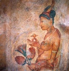 Apsaras, himmelsk nymf som erbjuder blommor, fresco, Sigiriyas befästa citadell (UNESCO:s världsarvslista).