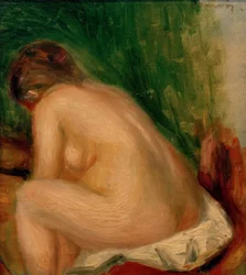 Sittande naken kvinna