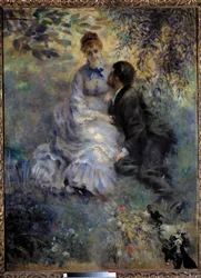 Älskande. Par som sitter i en trädgård. Målning av Pierre-Auguste Renoir (1841-1919)