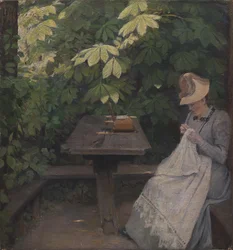 En sommarklädd dam i ett lusthus