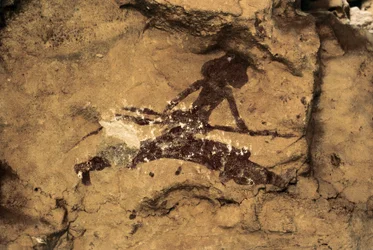 Rock Art: kvinnlig jägare. Förhistoria, övre paleolitikum. Tio Garroso-grottan, Spanien.