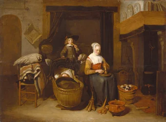 En familj som sitter runt en kökseld
