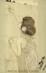 Flicka som skriver på en vägg