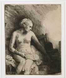 En kvinna vid badet med en hatt bredvid sig, 1658