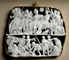 Romersk konst: onyx cameo gjord av skulptören Dioscuride (eller Dioscorides) på två nivåer. På toppen välkomnar kejsar Augustus (63 f.Kr.-14 e.Kr.), omgiven av mytologiska gudar, sin efterträdare Tibere (42 f.Kr. - 37 e.Kr.). Från vänster till höger, Tiber
