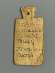 Mummy Tag med grekisk inskription (trä & pigment)