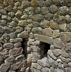 Nuragic Culture (Nuraghi) Sardinian: Ruinerna av den nuragiska staden på den megalitiska platsen Su Nuraxi: The Royal Tower. 1100-1050 f.Kr. Handel Sardinien Italien
