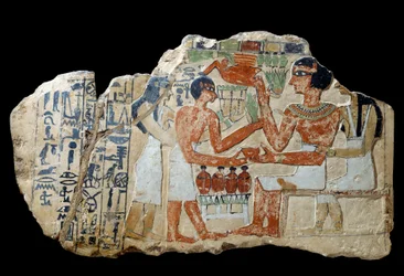 Egyptisk antikvitet: Iri stele i kalksten. Ett par som ger ett erbjudande. Första mellanperioden (2200-2033 f.Kr.) Sön. 0,3x0,52 m Paris, Louvren