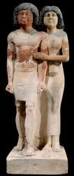 Egyptisk antikvitet: Kalkstensstaty av paret Raherka och Meresankh. 5:e dynastin. Gamla riket (omkring 2700-2200 f.Kr.). H. 0,52 x 0,21 m. Paris, Musée du Louvre