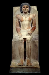 Egyptisk antikviteter: kalkstensstatyett av Kai, schakalens administratör. Från Saqqara. Gamla riket, femte dynastin. Paris, Louvren-museet.