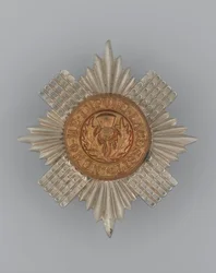 Kepsmärke, ca 1896-1920 (metall)
