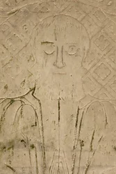 Detalj av en klosterrelief (sten)