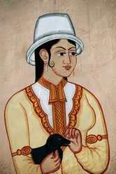 Väggmålning av brittisk dam med hundvalp, Jaipur, Rajasthan, Indien
