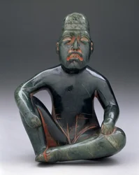 Sittande figur med upphöjt knä, Highland Olmec, San Martin Texmelucan
