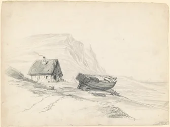 Hus och båt vid stranden