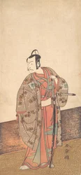 Skådespelaren Ichikawa Danjuro V står inne i ett hus och framför en engawa, ca. 1772.