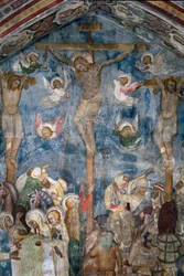 Korsfästelse av Kristus "INRI"" på korset. Detalj av en fresk av skolan i Siena