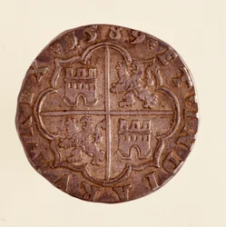 Silvermynt (8 realer) från Spanien: Filips (Filippo eller Philippe) II:s regeringstid (1556-1598). 1589 Diam. 3,5 cm Neapel, museo archeologico