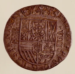 Silvermynt (8 realer) från Spanien: Filips (Filippo eller Philippe) II:s regeringstid (1556-1598). 1589 Diam. 3,5 cm Neapel, museo archeologico