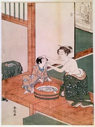 En naken mor tvättar sitt barn i Japan bredvid ett kar fyllt med vatten. Träsnitt av Suzuki Harunobu (1725-1770). 1766-1768. Mått: 0,27 x 0,201 m. Paris, Musée Guimet, Nationella museet för asiatisk konst