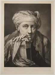 Man med turban, lutad mot en bok