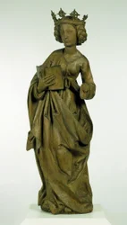 Kvinnlig helgon, ca 1490-1495 (lindträ med spår av färg)