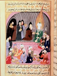 Profeten Muhammad (Muhammad eller Muhammad) (570-632), med täckt ansikte, välkomnas under en resa till Syrien av kristna munkar som serverar honom en måltid. Turkisk miniatyr från 1700-talet. Topkapimuseet, Istanbul, Turkiet