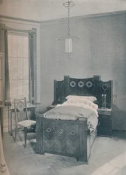 En barnsäng designad av Peter Behrens, utförd av TD Heymann, 1901