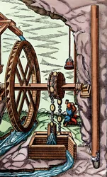 En gruva som dräneras av en tras-och-kedjepump som drivs av ett överskjutet vattenhjul, 1556