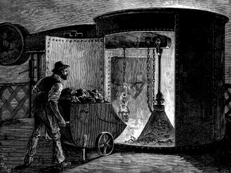 Laddar en masugn vid Govan Iron Works, Skottland, c1885
