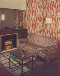 Hörn av en lounge i en lägenhet i London av Ian Henderson, c1945