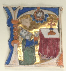 Historikerad initial utskuren ur en bibel, 1200-talet.