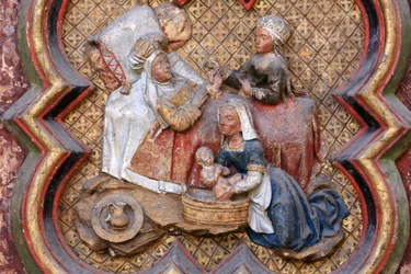 Johannes döparens historia: "" Johannes döparens födelse." Basrelief av norra koret (1531). Polykrom sten. 1531. Amiens katedral, Amiens, Frankrike