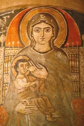 Holy Virgin och Saint John Kame koptiska klosterfresk: Maria ammar Jesus Egypten