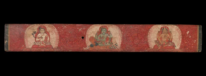 Manuskriptomslag med Vishnu flankerad av Lakshmi och Sarasvati, 1300-talet.