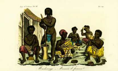 Muchicongo-män och många fruar utanför en hydda, Angola