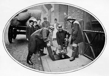 Sewermen going below, London, c1903 1903