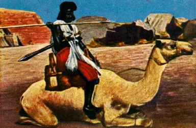 Sudanesisk krigare som rider på en kamel, c1928.