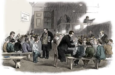 Lär pojkar att läsa i Ragged School Union School, Lambeth, London, 1868