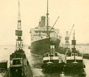 The Majestic Entering Dry Dock Hauled by Tugs, c1930.