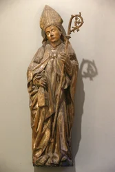Victoria and Albert Museum. Biskop helgon. Tyskland. Omkring 1470-80. Limewood med spår av färg. Storbritannien
