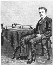 Thomas Alva Edison, amerikansk uppfinnare, med en tidig handdriven modell av sin fonograf, 1878